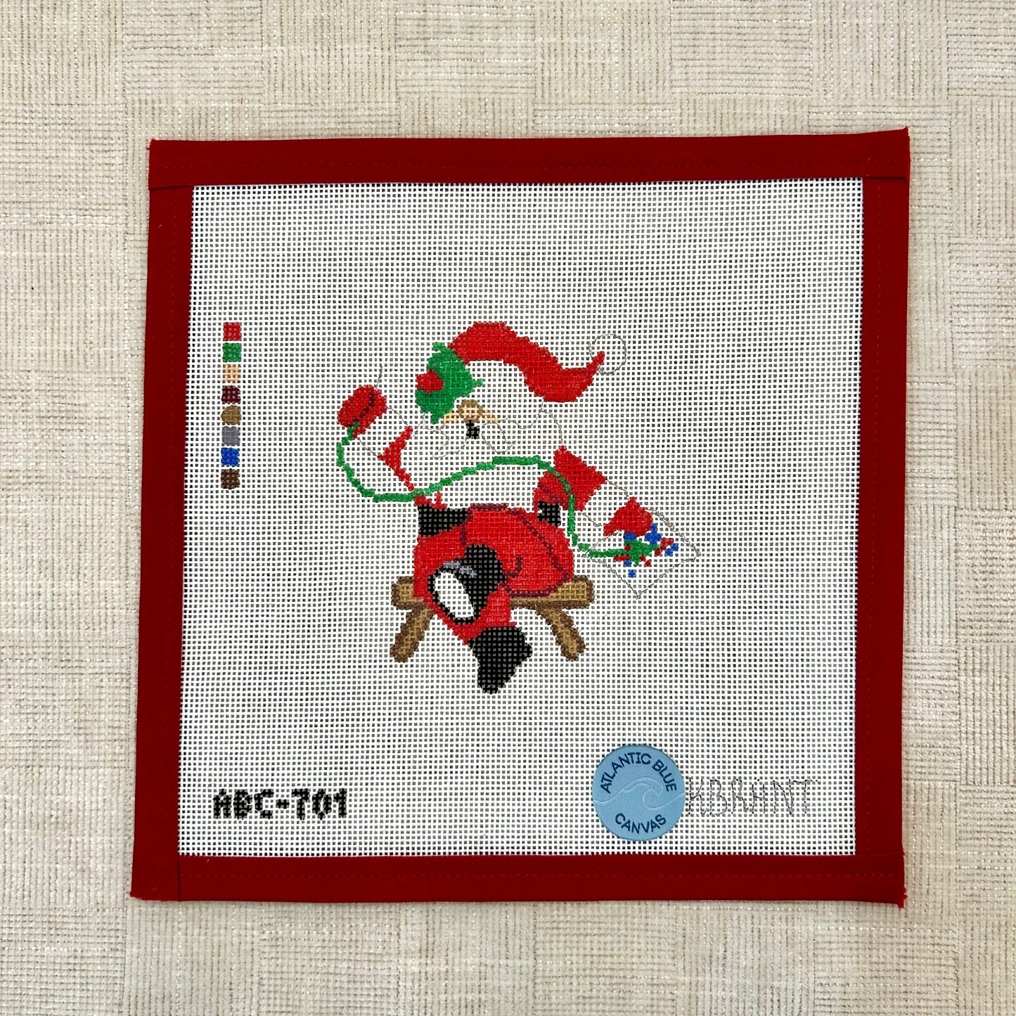 Needlepointing Santa