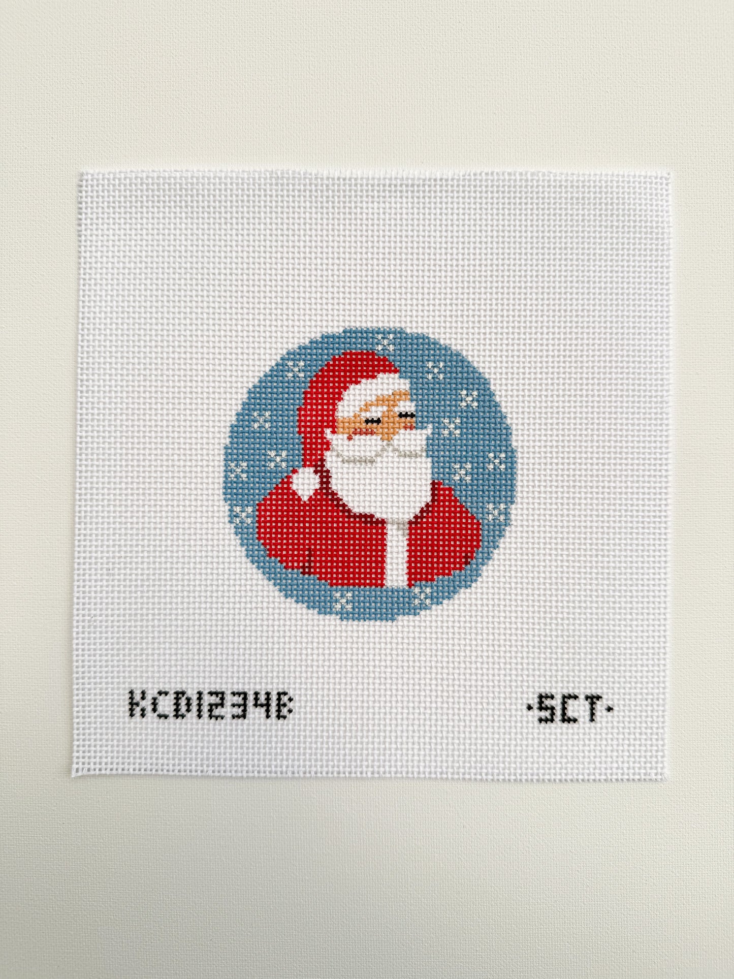 santa on medium blue round